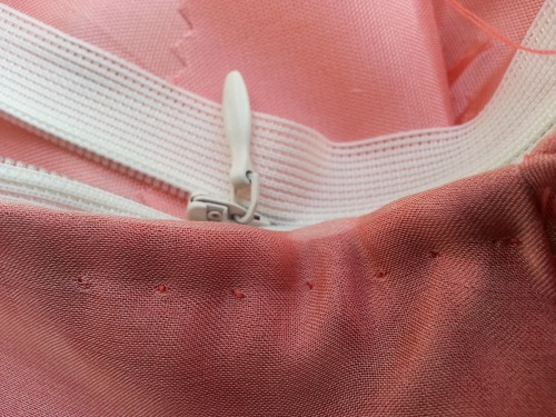 Pick stitch for inserting the zipper - a strong stick and decorative.